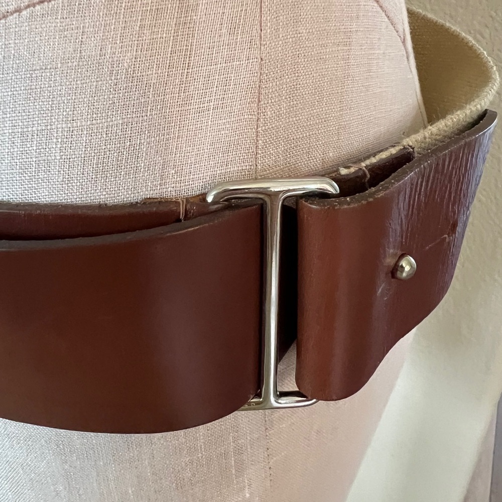 This is a vintage authentic Burberry, leather and canvas belt